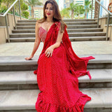 SHAHEEN ABBAS | TOMATO RED BANDHNI DRAPED RARA SAREE, GOTA CROP TOP AND BELT