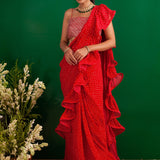 SHAHEEN ABBAS | TOMATO RED BANDHNI DRAPED RARA SAREE, GOTA CROP TOP AND BELT