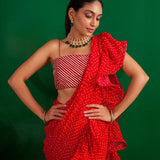 SHAHEEN ABBAS | TOMATO RED BANDHNI DRAPED RARA SAREE, GOTA CROP TOP AND BELT