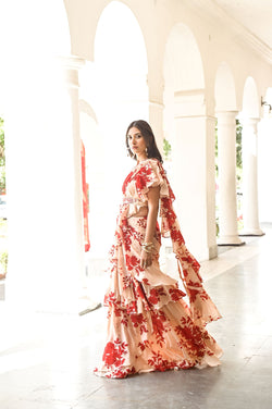 BEIGE AND RED ISHNA DRAPED SAREE , BELT AND EMBELLISHED CROP TOP